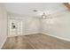 Bright bedroom featuring wood floors, recessed lighting, and a glass paned french doors at 3177 Bel Air Dr, Las Vegas, NV 89109
