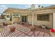 Covered patio featuring brick flooring and access to the home's interior at 3177 Bel Air Dr, Las Vegas, NV 89109