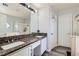 Bathroom features a large vanity with dual sinks, a soaking tub, and a separate shower at 3332 Beca Faith Dr, North Las Vegas, NV 89032