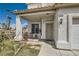 Welcoming front porch with stylish accents and a cozy seating area at 3332 Beca Faith Dr, North Las Vegas, NV 89032