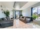 Comfortable living room with recessed lighting, tile flooring, and views of the neighborhood through windows at 3332 Beca Faith Dr, North Las Vegas, NV 89032