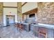 Clubhouse bar area with granite counters, stone accents, and comfortable seating at 35 Via Rizzuto, Henderson, NV 89011