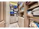 Walk-in closet with custom shelves and storage solutions for optimal organization at 35 Via Rizzuto, Henderson, NV 89011
