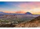 A sunset view showing the skyline, city and distant mountains at 35 Via Rizzuto, Henderson, NV 89011