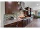 Close up shot of kitchen showcasing stainless steel appliances and decorative tile backsplash at 35 Via Rizzuto, Henderson, NV 89011