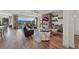 Spacious living room with fireplace, recessed lighting, and mountain views through sliding glass doors at 35 Via Rizzuto, Henderson, NV 89011