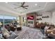 Spacious living room with brick fireplace, media center and comfortable leather furniture set at 35 Via Rizzuto, Henderson, NV 89011