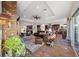Open floor plan features the living room with ceiling fan and access to the kitchen at 35 Via Rizzuto, Henderson, NV 89011