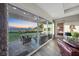 Stunning mountain views from the outdoor living area, as seen through large sliding glass doors at 35 Via Rizzuto, Henderson, NV 89011