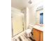 Bathroom with glass shower, toilet, vanity and vinyl flooring at 3735 Sand Pier St, Las Vegas, NV 89147