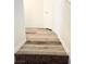 Carpeted stairs leading to an upper level with a white door at 3735 Sand Pier St, Las Vegas, NV 89147