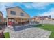 The home features a covered patio and an outdoor kitchen, perfect for entertaining at 42 Megan Dr, Henderson, NV 89074