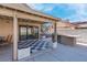 Enjoy outdoor dining on the covered patio and a built in grill in this backyard at 42 Megan Dr, Henderson, NV 89074