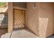 Close-up of the front door, featuring a unique sunburst design and modern hardware at 42 Megan Dr, Henderson, NV 89074