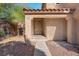 Inviting front entrance with a decorative security door and well-maintained landscaping at 42 Megan Dr, Henderson, NV 89074