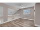 Bright loft features wood flooring and ceiling fan at 42 Megan Dr, Henderson, NV 89074