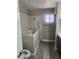 Accessible bathroom featuring a walk-in tub, grab bars, and tile surround at 4536 Payson Ave, Las Vegas, NV 89115