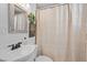 Cozy bathroom featuring neutral finishes, and a decorative shower curtain at 4578 Yellow Pine Ave, Mount Charleston, NV 89124