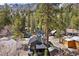 Charming mountain home nestled amongst the trees with mature landscaping and a metal roof at 4578 Yellow Pine Ave, Mount Charleston, NV 89124