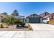 Charming single-story home featuring desert landscaping, solar panels and a spacious two-car garage at 4731 Torrence Dr, Las Vegas, NV 89103