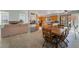 Open floor plan combining dining and living areas, creating a welcoming space at 4817 Friar Ln, Las Vegas, NV 89130