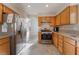Modern kitchen featuring stainless steel appliances and granite countertops at 4817 Friar Ln, Las Vegas, NV 89130