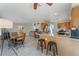 Spacious open kitchen area with seating, dining, and access to the living spaces at 4817 Friar Ln, Las Vegas, NV 89130