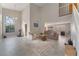 Bright living room boasts high ceilings, tile floors, and plenty of natural light at 4817 Friar Ln, Las Vegas, NV 89130