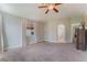 Spacious carpeted main bedroom with ensuite bathroom access at 4817 Friar Ln, Las Vegas, NV 89130