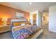 Cozy bedroom with a comfortable bed, stylish side tables, and a glimpse of the closet at 4828 Lilac Ridge Ave # 26, Las Vegas, NV 89141