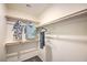 Walk-in closet with shelving, hanging bars, and organized storage for clothes and accessories at 4828 Lilac Ridge Ave # 26, Las Vegas, NV 89141