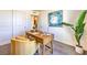 Bright home office features a modern desk, stylish chair, and vibrant artwork at 4828 Lilac Ridge Ave # 26, Las Vegas, NV 89141