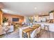 Open-concept living space with dining area, kitchen, and a comfortable living room setup at 4828 Lilac Ridge Ave # 26, Las Vegas, NV 89141