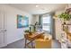 Inviting home office with modern desk, stylish shelving, and a comfortable seating area at 4828 Lilac Ridge Ave # 26, Las Vegas, NV 89141