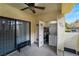 Enjoy indoor/outdoor living on this patio featuring a ceiling fan and in-unit washer and dryer at 4869 S Torrey Pines Dr # 101, Las Vegas, NV 89103