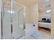 Bathroom featuring a shower and bathtub combination, complemented by neutral tile flooring and modern fixtures at 4920 River Splash Ave, Las Vegas, NV 89131