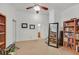 Spacious bedroom featuring light-colored walls, a ceiling fan, and ample space for furniture and personal items at 4920 River Splash Ave, Las Vegas, NV 89131