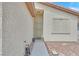 Welcoming front entrance with covered porch and desert-friendly landscaping detail at 4920 River Splash Ave, Las Vegas, NV 89131