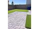 Backyard with artificial turf and patio pavers at 4993 Birchland Manor Ave, Las Vegas, NV 89139