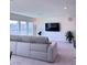 Spacious living room with comfortable seating, large windows, and modern amenities at 4993 Birchland Manor Ave, Las Vegas, NV 89139