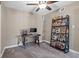 Bright bedroom featuring a desk, computer, ceiling fan, and bookshelf at 5001 Morris St, Las Vegas, NV 89122