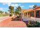 Charming backyard with covered patio, red rock landscaping, and privacy at 5029 Pacific Grove Dr, Las Vegas, NV 89130