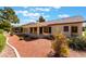 Private backyard with a covered patio, tidy landscaping, and beautiful desert charm at 5029 Pacific Grove Dr, Las Vegas, NV 89130