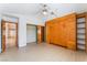 Bedroom featuring built-in shelving, Murphy bed, and walk-in closet at 5029 Pacific Grove Dr, Las Vegas, NV 89130