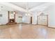 Bright, open living space with vaulted ceilings, tile flooring, brick fireplace, and abundant natural light at 5029 Pacific Grove Dr, Las Vegas, NV 89130