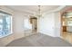 Chandelier illuminates a dining area at 5231 E Chasemoor St, Pahrump, NV 89061