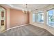 Dining area boasts a tray ceiling and lots of natural light at 5231 E Chasemoor St, Pahrump, NV 89061