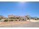 Inviting single-story home with a tile roof, well-kept landscaping, and a spacious driveway, perfect for Gathering living at 5231 E Chasemoor St, Pahrump, NV 89061