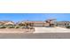 Expansive single-story home with a large driveway and RV parking at 5231 E Chasemoor St, Pahrump, NV 89061
