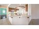 Kitchen features white tiled counter and wood cabinets at 5231 E Chasemoor St, Pahrump, NV 89061